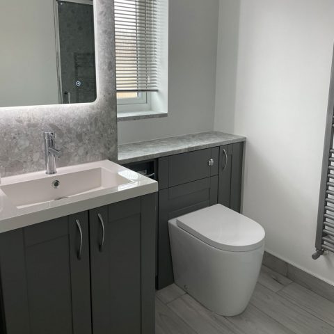 bathroom sink toilet unit illuminated mirror